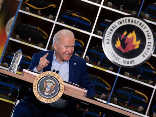 US President Joe Biden speaks during a briefing at the National Interagency Fire Center at Boise Airport on September 13, 2021, in Boise, Idaho. - US President Joe Biden kicked off a visit to scorched western states Monday to hammer home his case on climate change and big public investments, …