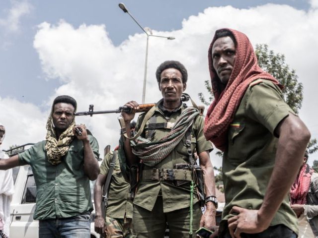 Amhara militiamen stand on guard in Dabat, 70 kilometres northeast of the city of Gondar,