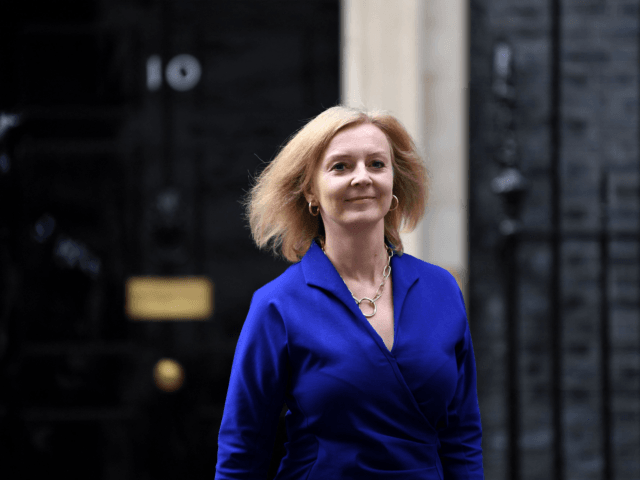 Britain's newly appointed Britain's Foreign Secretary Liz Truss (L) leaves from 10 Downing Street in central London on September 15, 2021. - British Prime Minister Boris Johnson on Wednesday readied a fresh cabinet "to build back better from the pandemic" in a reshuffle that cast Foreign Secretary Dominic Raab's future …