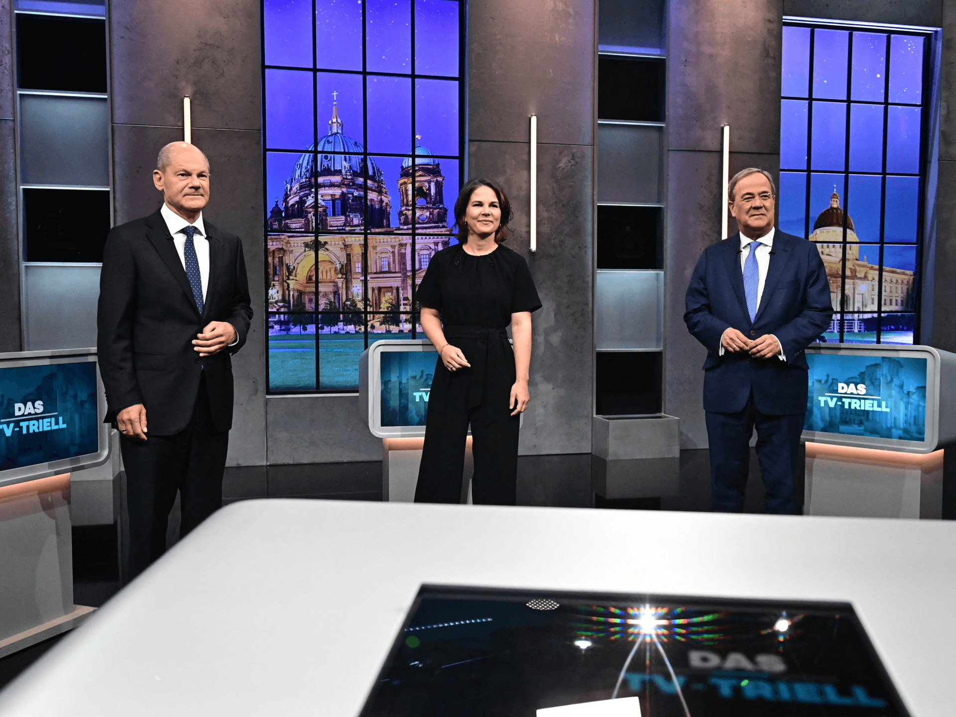 Top candidates for the upcoming German general elections (L-R) Olaf Scholz of the Social Democrats SPD, Annalena Baerbock of Germany's Greens (Die Gruenen) and Armin Laschet of the conservative CDU/CSU party union pose for pictures before a "Triell" television debate on September 19, 2021 in Berlin, ahead of Germany's general elections scheduled for September 26. (Photo by Tobias Schwarz / AFP) (Photo by TOBIAS SCHWARZ/AFP via Getty Images)