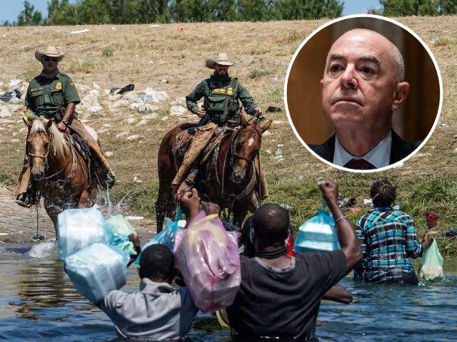 (INSET: Alejandro Mayorkas) A United States Border Patrol agent on horseback tries to stop a Haitian migrant from entering an encampment on the banks of the Rio Grande near the Acuna Del Rio International Bridge in Del Rio, Texas on September 19, 2021. - The United States said Saturday it would ramp up deportation flights for thousands of migrants who flooded into the Texas border city of Del Rio, as authorities scramble to alleviate a burgeoning crisis for President Joe Biden's administration. (Photo by PAUL RATJE / AFP) (Photo by PAUL RATJE/AFP via Getty Images)