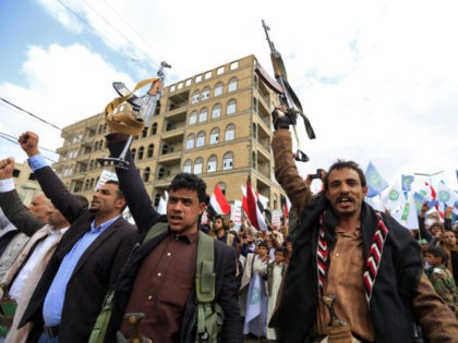 Yemeni supporters of the Shiite Huthi movement take part in a ceremony commemorating the seventh anniversary of the Huthi takeover of the capital Sanaa, on September 21, 2021. - The conflict in Yemen flared in 2014 when the Huthis seized the capital Sanaa, prompting Saudi-led intervention to prop up the …