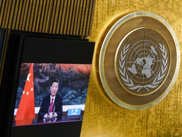 NEW YORK, NEW YORK - SEPTEMBER 21: Chinese President Xi Jinping is seen on a video screen as he addresses the annual gathering in New York City for the 76th session of the United Nations General Assembly (UNGA) on September 21, 2021 in New York City. More than 100 heads …