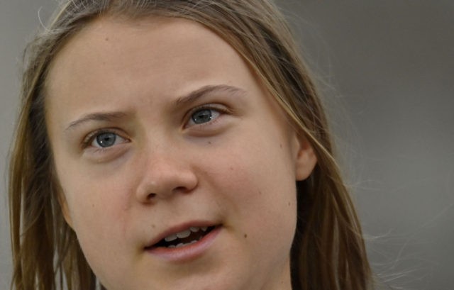 Swedish climate activist Greta Thunberg speaks to demonstrators taking part in a Fridays for Future global climate strike in Berlin on September 24, 2021, two days ahead of the German federal election. - Activists of the movement demonstrate worldwide and in over 350 German cities to call for structural changes …