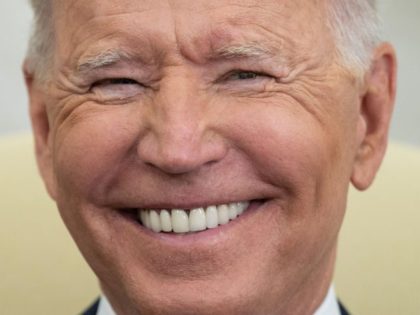 TOPSHOT - US President Joe Biden smiles during a meeting with Indian Prime Minister Narend