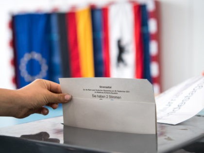 BERLIN, GERMANY - SEPTEMBER 26: Voters cast their ballots in federal parliamentary elections on September 26, 2021 in Berlin, Germany. Voters are going to the polls nationwide today in elections that herald the end of the 16-year chancellorship of Angela Merkel and the strong possibility of a new, German Social …