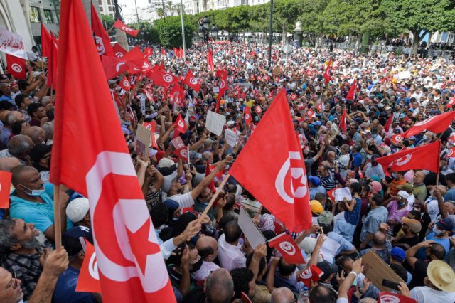 Demonstrators chant slogans during a protest in Tunisia's capital Tunis on September 26, 2