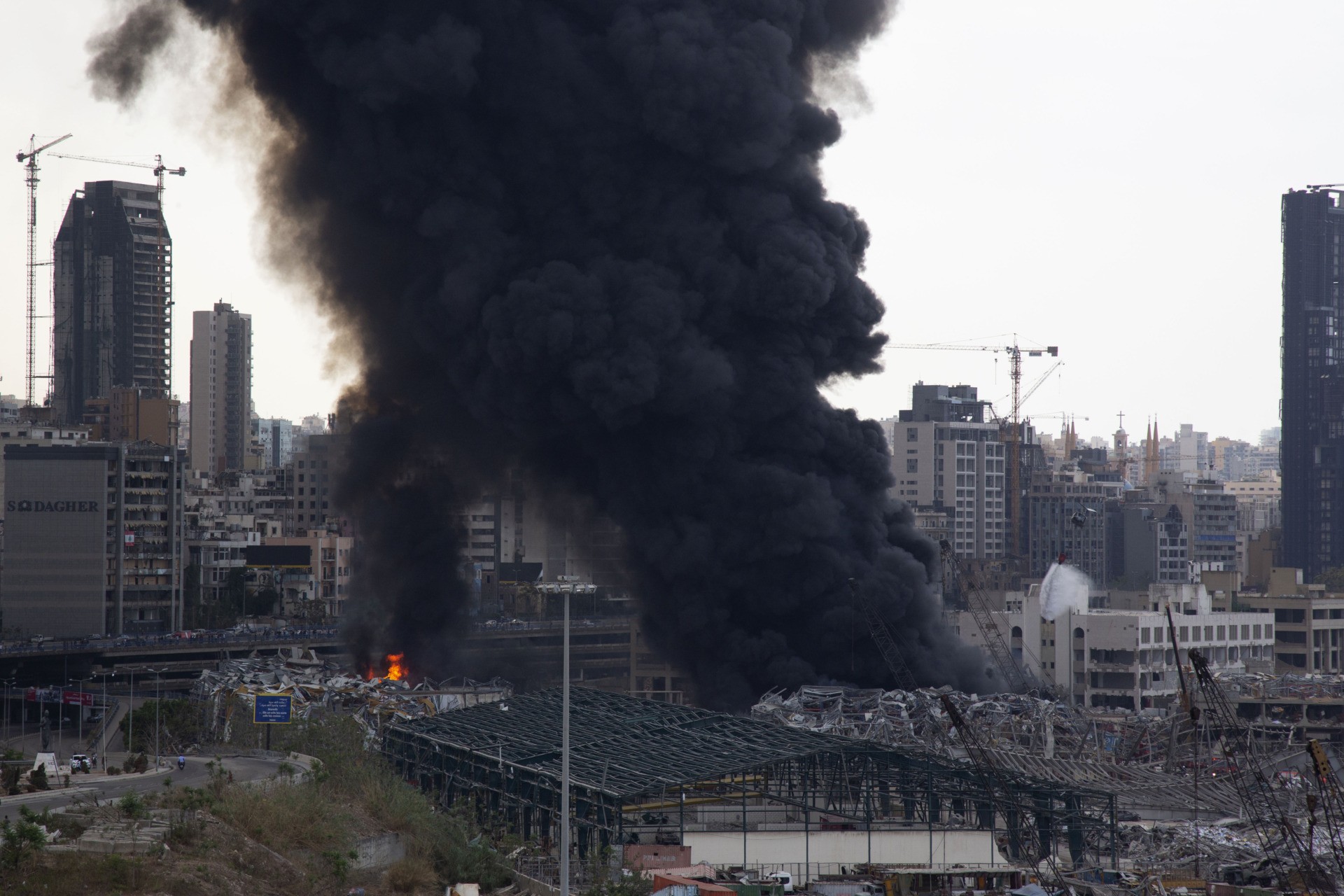 BEIRUT, LEBANON - SEPTEMBER 10: Smoke rises from a fire which has broken out at the Beirut Port on September 10, 2020 in Beirut, Lebanon. The fire broke out in a structure in the city's heavily damaged port facility, the site of last month's explosion that killed more than 190 people. (Photo by Sam Tarling/Getty Images)