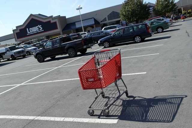ALEXANDRIA, VA - OCTOBER 17: A shopping cart is left at the parking lot of a Lowe’s stor