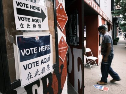 NEW YORK, NEW YORK - JUNE 22: Signs alert people to a voting site in Manhattan as voters h