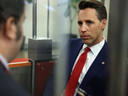 WASHINGTON, DC - JULY 20: Sen. Josh Hawley (R-MO) speaks to reporters in the Senate Subway on Capitol Hill on July 20, 2021 in Washington, DC. The Senate is expected to hold a procedural vote on the proposed bipartisan infrastructure legislation later this week although the drafting process is not …