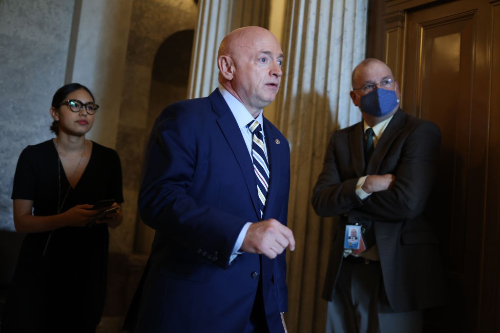 WASHINGTON, DC - JULY 21: U.S. Sen. Mark Kelly (D-AZ) departs from the Senate Chambers in the U.S. Capitol on July 21, 2021 in Washington, DC. The Senate is expected to hold a cloture vote on the bipartisan infrastructure bill later today. (Photo by Anna Moneymaker/Getty Images)