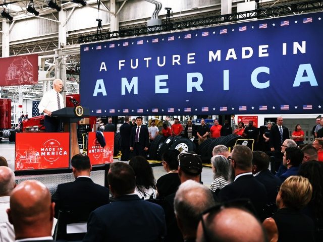 MACUNGIE, PENNSYLVANIA - JULY 28: U.S. President Joe Biden speaks at Mack Truck Lehigh Valley Operations on July 28, 2021 in Macungie, Pennsylvania. President Biden spoke to a crowd of supporters at Mack Truck Lehigh Valley Operations about the importance of manufacturing in America and buying products made in America …