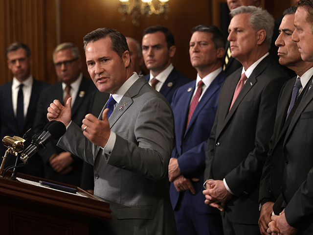 U.S. Rep. Michael Waltz (R-FL) (3rd L) speaks as House Minority Leader Rep. Kevin McCarthy (R-CA) (3rd R) and other House Republican veterans listen during a news conference at Rayburn Room of the U.S. Capitol August 31, 2021 in Washington, DC. House Minority Leader McCarthy held a news conference on …
