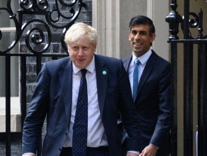 LONDON, ENGLAND - SEPTEMBER 07: Prime Minister Boris Johnson (L) and Chancellor of the Exchequer Rishi Sunak (C) walk towards the door of number 9, Downing Street ahead of a press conference on September 07, 2021 in London, England. Prime Minister Boris Johnson today announced a rise in national insurance …