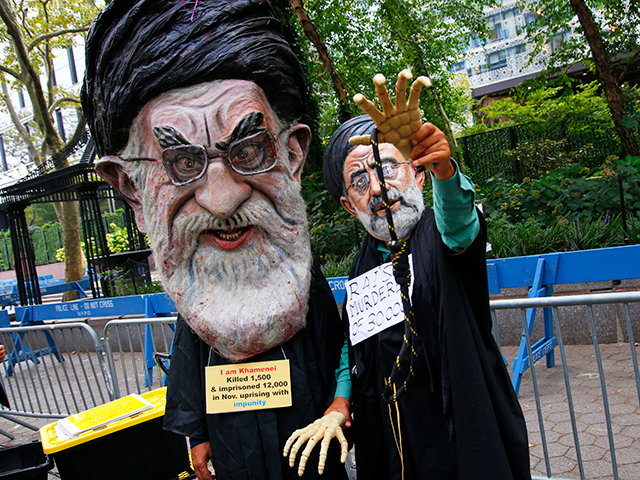 People protest Iranian President Ebrahim Raisi near the United Nations General Assembly on September 21, 2021 in New York City. The 76th session of the UN General Assembly began today with more than 100 heads of state or government attending in person, although the size of delegations are smaller due to the Covid-19 pandemic. (Photo by Michael M. Santiago/Getty Images)