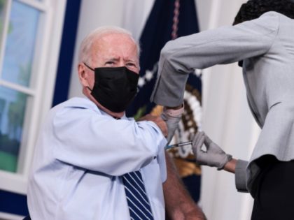 WASHINGTON, DC - SEPTEMBER 27: U.S. President Joe Biden receives a third dose of the Pfize