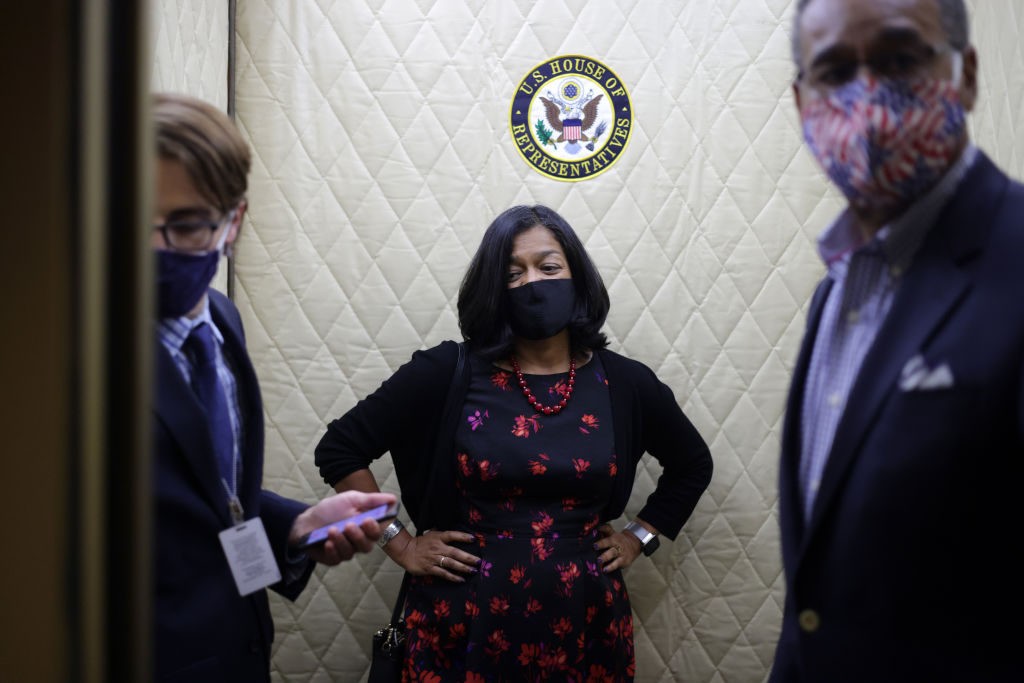 WASHINGTON, DC - SEPTEMBER 27: U.S. Rep. Pramila Jayapal (D-WA) (C) leaves after a House Democrats closed-door meeting at the U.S. Capitol September 27, 2021 in Washington, DC. Congress is expected to tackle continued funding to avert a government shutdown before a Friday deadline, vote on a $1 trillion infrastructure bill, and continue work on a $3.5 trillion infrastructure, social safety net and climate change package. (Photo by Alex Wong/Getty Images)