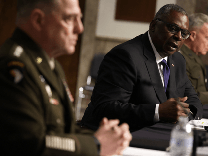 U.S. Secretary of Defense Lloyd Austin (C), Chairman of the Joint Chiefs of Staff Gen. Mark Milley (L) and Commander of U.S. Central Command Gen. Kenneth McKenzie (R) testify during a hearing before Senate Armed Services Committee at Dirksen Senate Office Building September 28, 2021 on Capitol Hill in Washington, …
