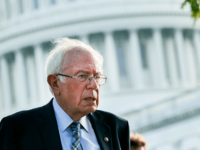 Sen. Bernie Sanders (I-VT) speaks to a reporter outside of the U.S. Capitol on September 28, 2021 in Washington, DC. Congress is currently working to pass a government spending bill, an infrastructure package and an increase to the debt limit. (Photo by Kevin Dietsch/Getty Images)