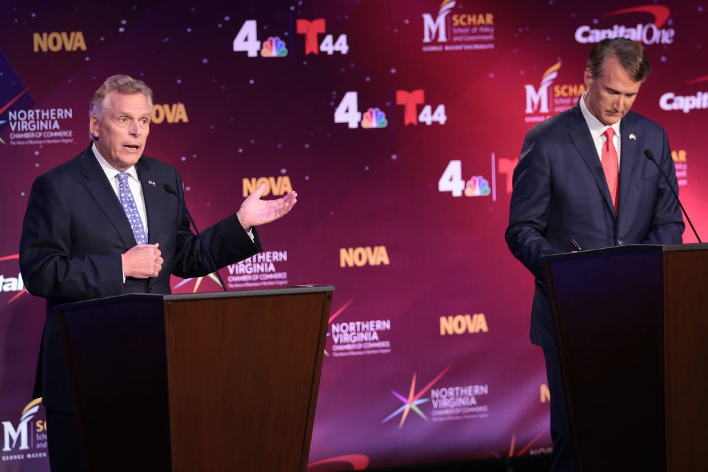 ALEXANDRIA, VIRGINIA - SEPTEMBER 28: Former Virginia Gov. Terry McAuliffe (D-VA) (L) debates Republican gubernatorial candidate Glenn Youngkin in a debate hosted by the Northern Virginia Chamber of Commerce September 28, 2021 in Alexandria, Virginia. The 2021 Virginia gubernatorial election will be held on November 2. (Photo by Win McNamee/Getty Images)