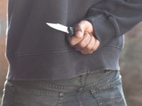 Migrant Spits at Police Then Stabs Himself with Knife Hidden in His Anus