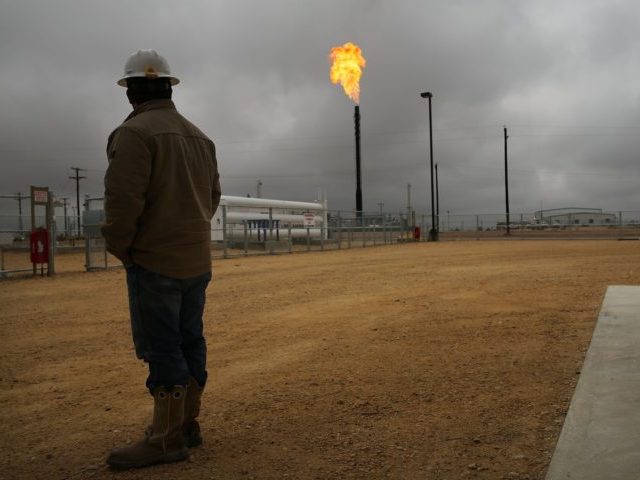 GARDEN CITY, TX - FEBRUARY 05: Flared natural gas is burned off at Apache Corporations operations at the Deadwood natural gas plant in the Permian Basin on February 5, 2015 in Garden City, Texas. Apache sends an estimated 50-52 million cubic feet per day of natural gas to this plant. …
