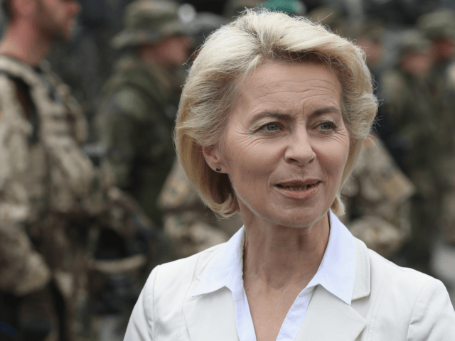 NEUSTADT AM RUEBENBERGE , GERMANY - JUNE 29: German Defense Minister Ursula von der Leyen chats with soldiers of the Bundeswehr, the German armed forces, following a demonstration of capabilities of Panzergranadierbataillon 33 of the 1st Panzer Division (1. Panzerdivision) that included the new Puma infantry fighting vehicle on June …