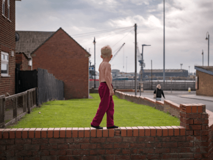 HARTLEPOOL, ENGLAND - SEPTEMBER 04: Children play on the streets of the Headlands area of