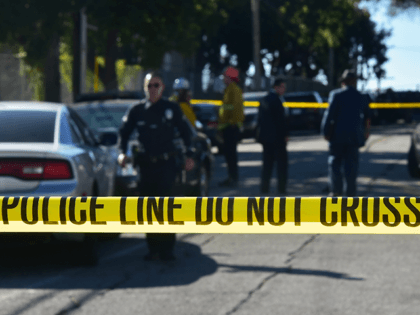 Police guard a roadblock near Salvadore Castro Middle School in Los Angeles, California on February 1, 2018, where two students were wounded, one critically, in a school shooting. - Two 15-year-old students in Los Angeles were shot and wounded in class Thursday, according to witnesses and local media, in the …