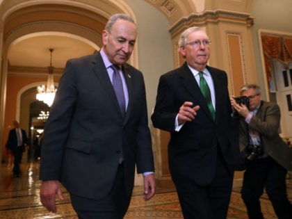 WASHINGTON, DC - FEBRUARY 07: Senate Minority Leader Charles Schumer (D-NY) (L) and Senate Majority Leader Mitch McConnell (R-KY) walk side-by-side to the Senate Chamber at the U.S. Capitol February 7, 2018 in Washington, DC. The two leaders announced they had reached agreement on a 2-year budget deal that will …