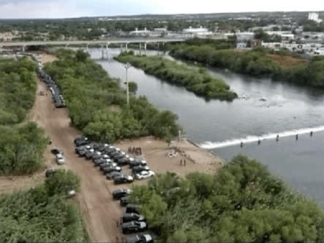 Dozens of Texas DPS Highway Patrol vehicles line up to stop the flow of migrants into the makeshift camp in Del Rio, Texas. (Photo: Texas Department of Public Safety)