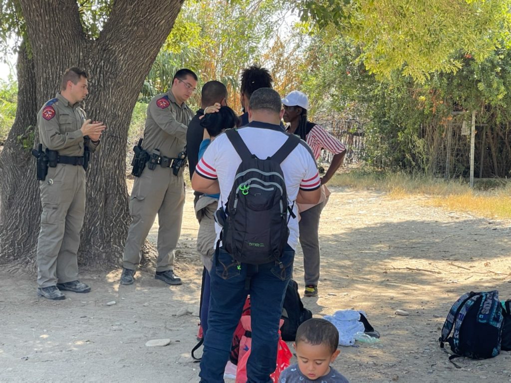 Texas Department of Public Safety Troopers arrest a Venezuelan migrant for trespassing after the group crossed the Rio Grande onto private property. (Photo: Randy Clark/Breitbart Texas)