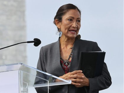 WASHINGTON, DC - SEPTEMBER 17: Interior Secretary Deb Haaland delivers remarks during the opening ceremony of 'In America: Remember,' a public art installation commemorating all the Americans who have died due to COVID-19 near the Washington Monument on September 17, 2021 in Washington, DC. The concept of artist Suzanne Brennan …