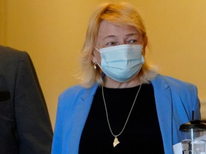 Gov. Janet Mills wears a face covering while walking through the halls of the State House, Wednesday, June 2, 2021, in Augusta, Maine. (AP Photo/Robert F. Bukaty)