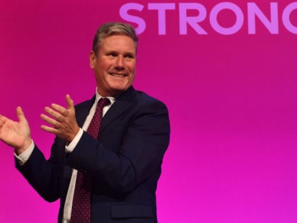 Labour party leader Keir Starmer applauds Shadow Chancellor of the Exchequer Rachel Reeves after her speech on the third day of the annual Labour Party conference in Brighton, on the south coast of England on September 27, 2021. (Photo by JUSTIN TALLIS / AFP) (Photo by JUSTIN TALLIS/AFP via Getty …
