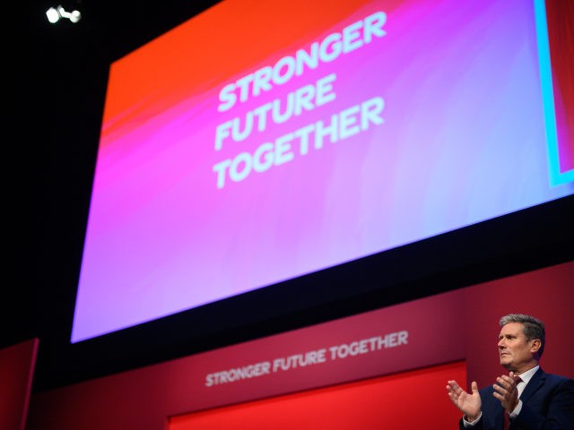 BRIGHTON, ENGLAND - SEPTEMBER 25: Labour Party leader Sir Keir Starmer applauds as a mark