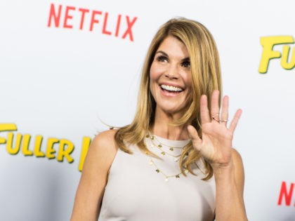 LOS ANGELES, CA - FEBRUARY 16: Actress Lori Loughlin attends the premiere of Netflix'