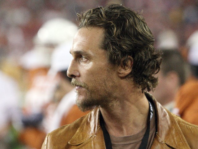Actor Matthew McConaughey watches Texas and Ohio State play during the Fiesta Bowl NCAA college football game in Glendale, Ariz., Monday, Jan. 5, 2009. (AP Photo/Ross D. Franklin)