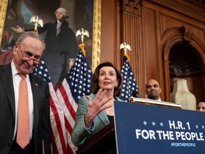 Senate Minority Leader Chuck Schumer, D-N.Y., left, and Speaker of the House Nancy Pelosi, D-Calif., call on Senate Majority Leader Mitch McConnell, R-Ky., to bring the Democrats' HR-1 "For the People Act" to the floor for a vote, during an event on Capitol Hill in Washington, Tuesday, March 10, 2020. …
