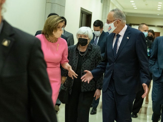 Speaker of the Nancy Pelosi (D-CA) (L) and Senate Majority Leader Charles Schumer (D-NY) (R) walk with Treasury Secretary Janet Yellen at the U.S. Capitol on September 23, 2021 in Washington, DC. Congress is currently in negotiations to pass a spending bill and raise the debt limit with the threat …