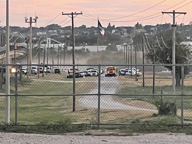 A Texas school bus arrives to begin moving migrants from the Del Rio Camp. (Photo: U.S. Border Patrol/Del Rio Sector)