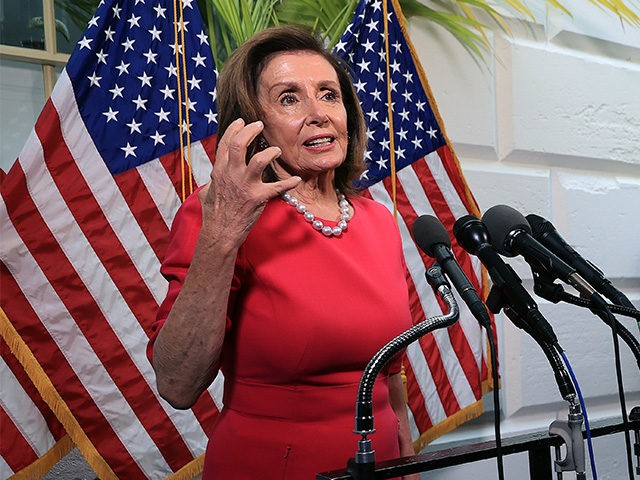 WASHINGTON, DC - SEPTEMBER 28: Speaker of the House Nancy Pelosi (D-CA) talks to reporters following the House Democratic caucus meeting at the U.S. Capitol on September 28, 2021 in Washington, DC. Pelosi told her caucus that the House will move forward with a $1 trillion infrastructure bill on Thursday …