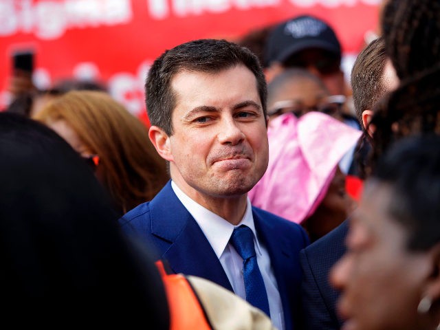 Democratic presidential candidate, former South Bend Mayor Pete Buttigieg greets people before marching in the annual Bloody Sunday March across the Edmund Pettus Bridge in Selma, Alabama on March 1, 2020. (Photo by Joshua Lott / AFP) / The erroneous mention[s] appearing in the metadata of this photo by Joshua …