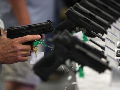 Smith and Wesson handguns are displayed during the NRA Annual Meeting & Exhibits at the Kay Bailey Hutchison Convention Center on May 5, 2018 in Dallas, Texas. (Justin Sullivan/Getty Images)