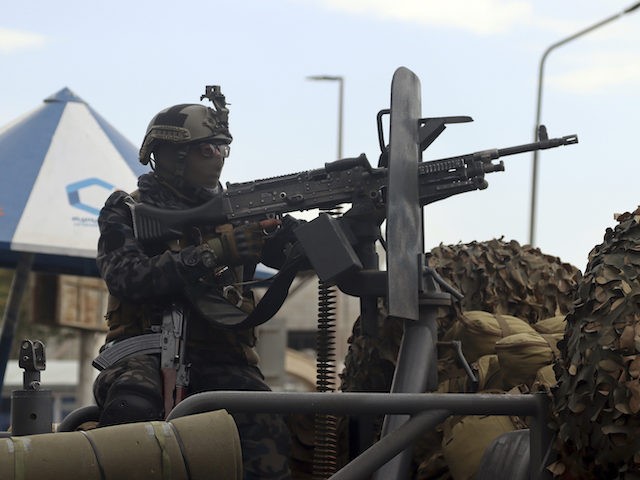 Taliban special force fighters arrive inside the Hamid Karzai International Airport after