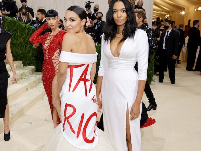 Alexandria Ocasio-Cortez (L) attends the 2021 Met Gala Celebrating In America: A Lexicon Of Fashion at Metropolitan Museum of Art on September 13, 2021, in New York City. (Mike Coppola/Getty Images)