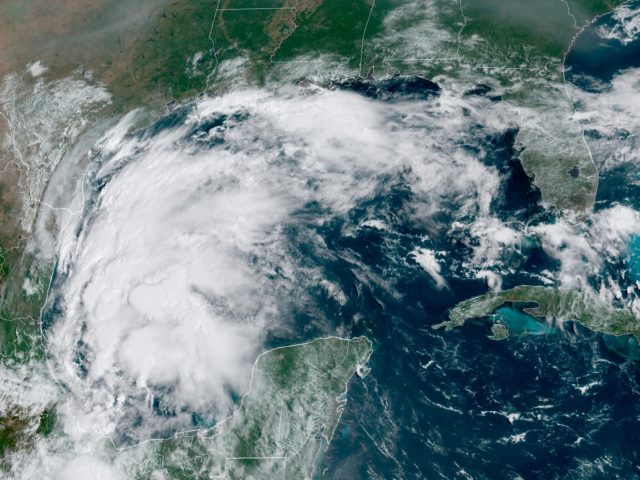 This satellite image provided by NOAA shows Tropical Storm Nicholas in the Gulf of Mexico