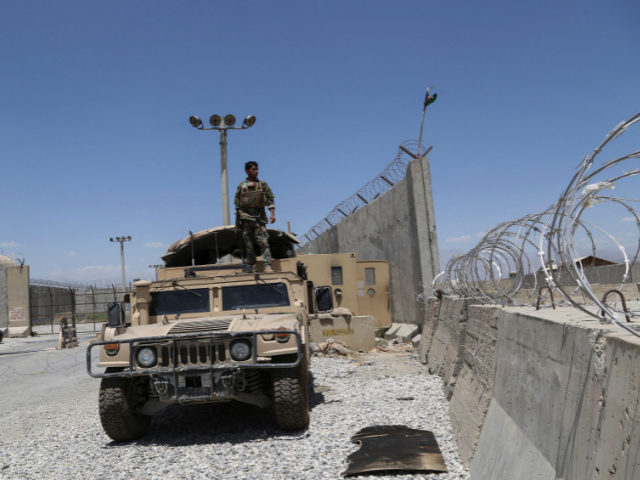 An Afghan National Army (ANA) soldier looks out while standing on a Humvee vehicle at Bagram Air Base, after all US and NATO troops left, some 70 Km north of Kabul on July 2, 2021. (Photo by Zakeria HASHIMI / AFP) (Photo by ZAKERIA HASHIMI/AFP via Getty Images)