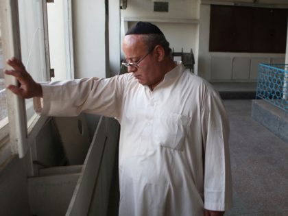 n this photo taken Saturday, Aug. 29, 2009, Zebulon Simentov, the last known Jew living in Afghanistan, closes the window to the synagogue he cares for in his Kabul home. Simentov is the caretaker and sole member of Afghanistan's only working synagogue. (AP Photo/David Goldman)